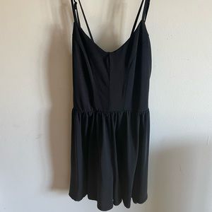 Black strappy/backless romper
